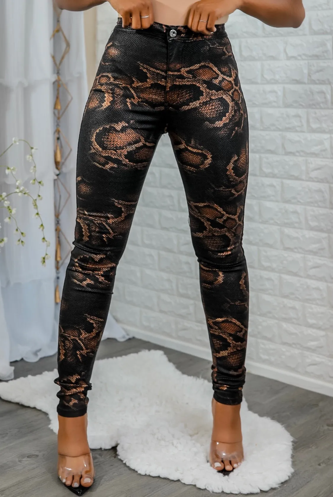 Coated Snake Print Skinny Jeans