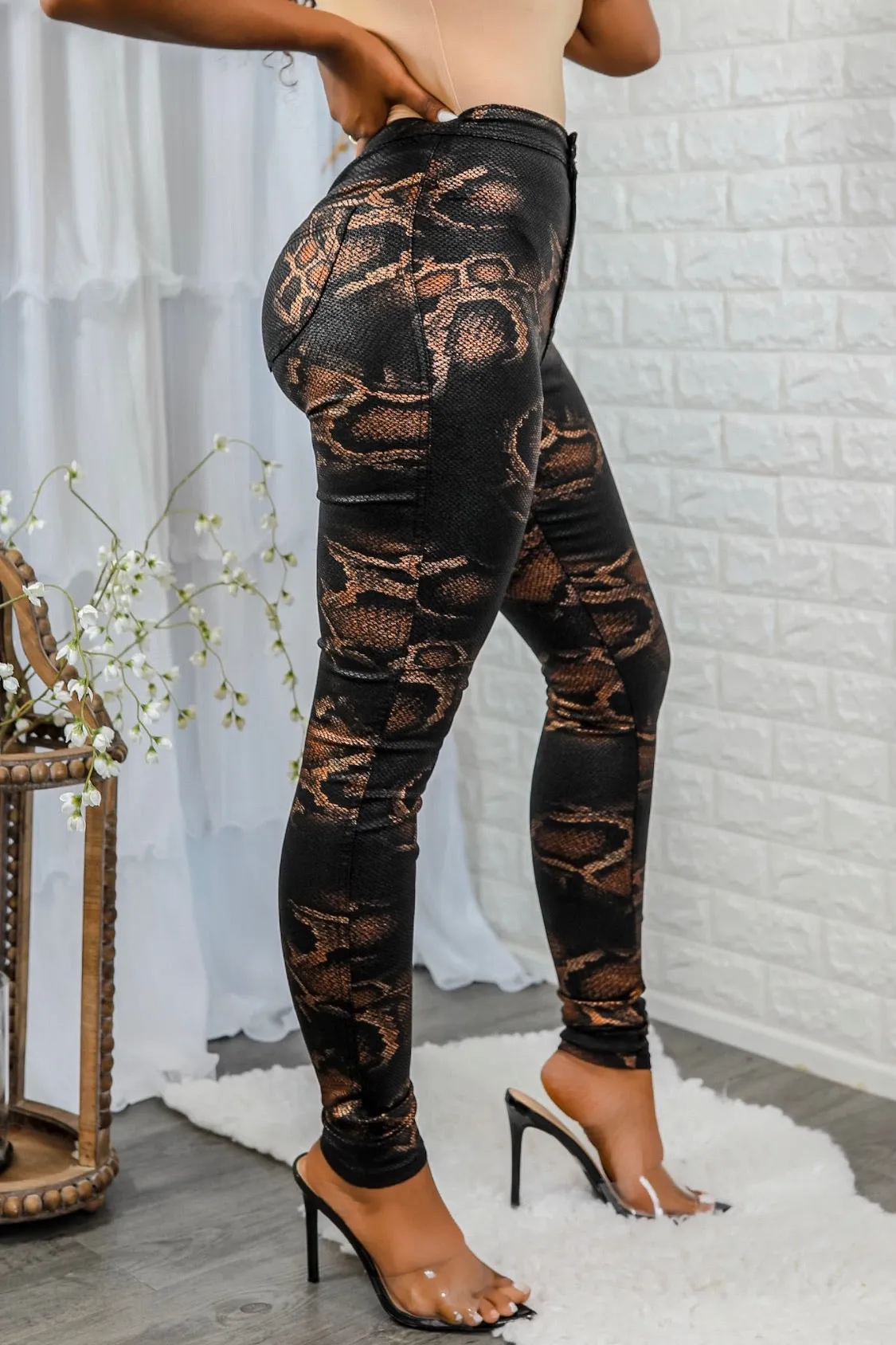 Coated Snake Print Skinny Jeans