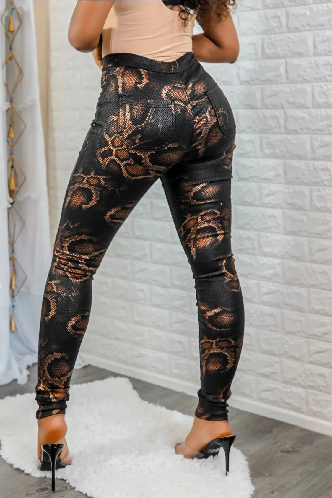 Coated Snake Print Skinny Jeans