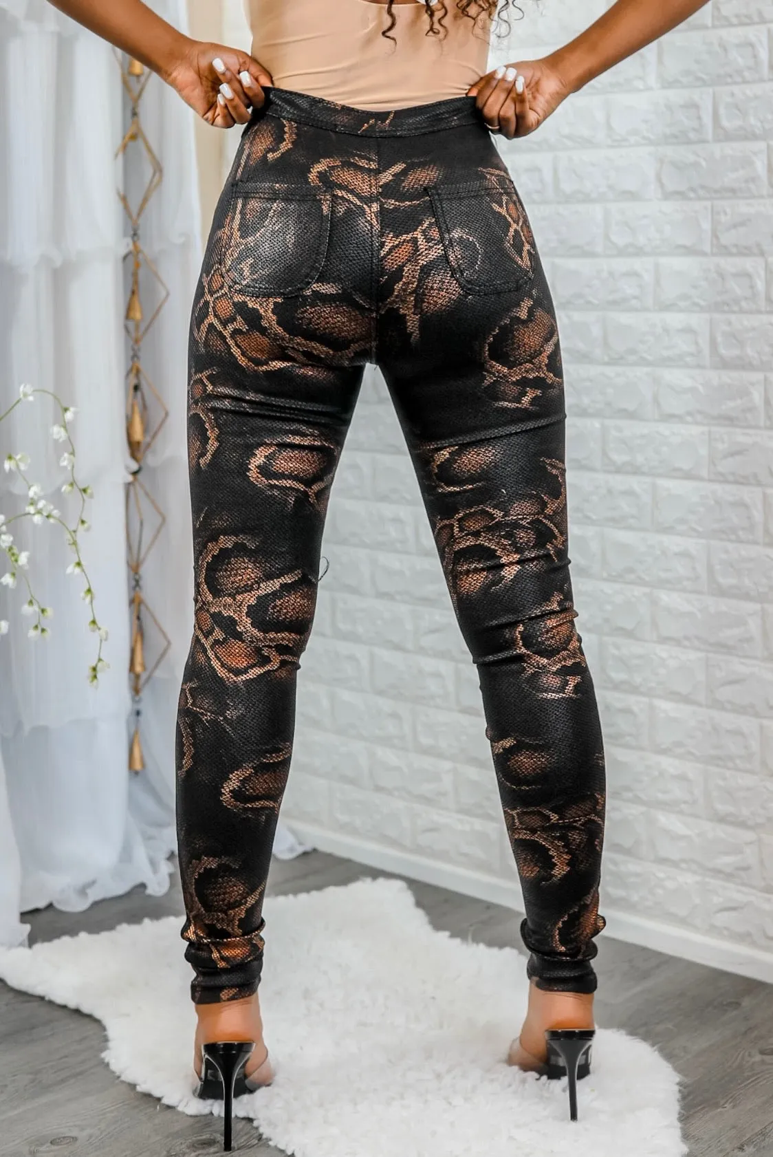 Coated Snake Print Skinny Jeans