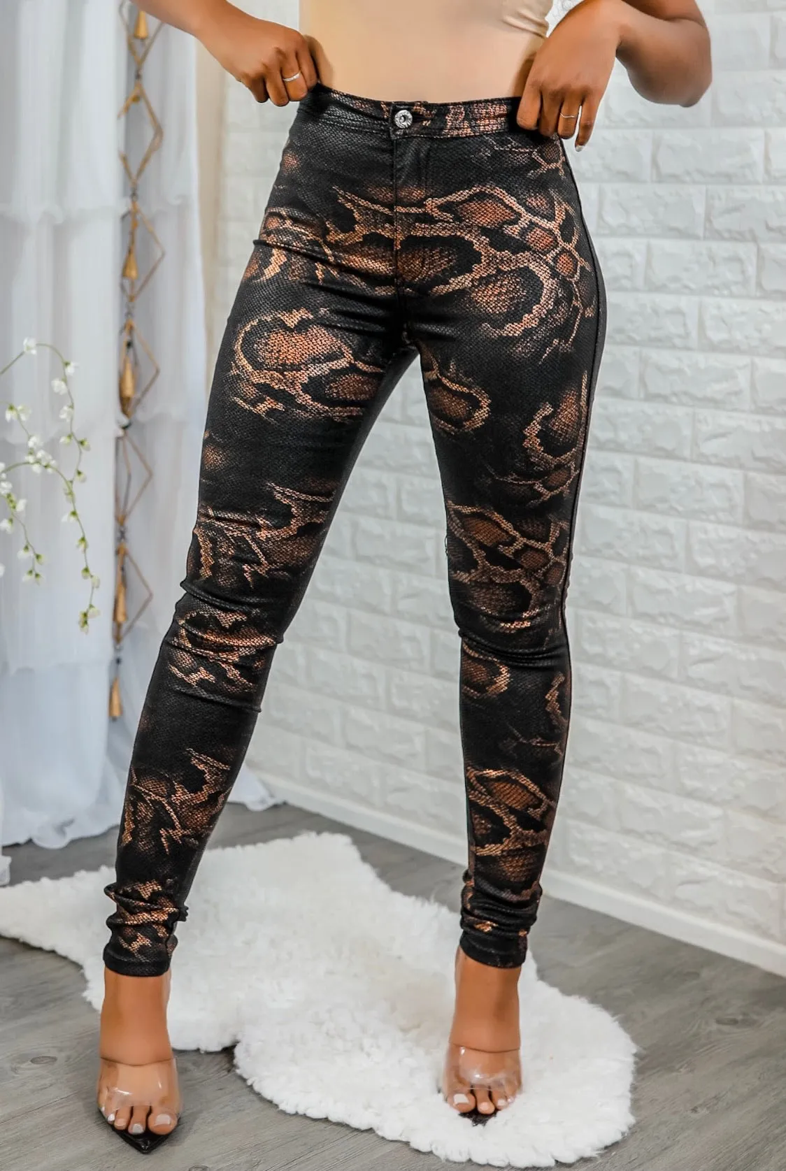 Coated Snake Print Skinny Jeans